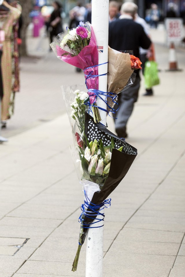  Flowers were left at the scene after his horrific killing yesterday afternoon