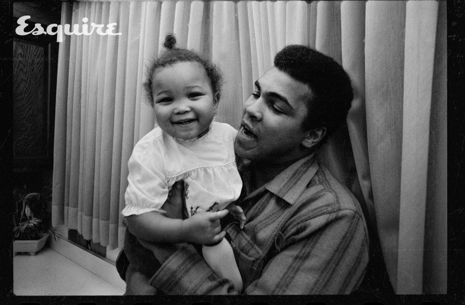 After the fight Ali hold his two-year-old daughter Maryum at home