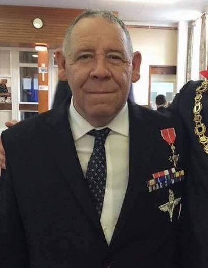  Walter Mitty war veteran Konnor Collins poses with medals before his impressive military history is exposed as being a web of lies