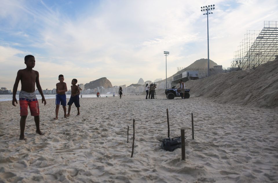  Children are pictured playing near the human remains