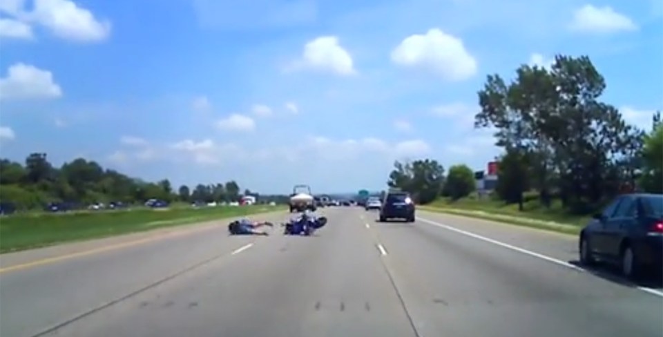  The rider, Brendan Jankowski hit the mat full on, and was sent flying into the air on his motorbike, before crashing back to the traffic lanes