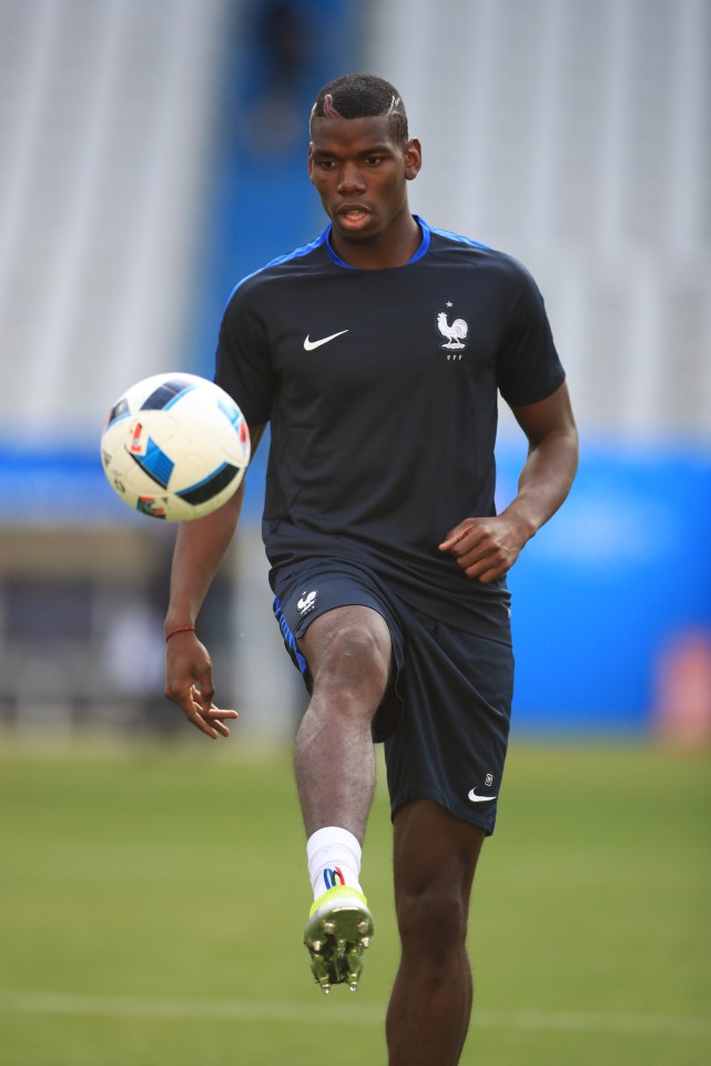  Paul Pogba of France warms up ahead of opening Euro 2016 game against Romania