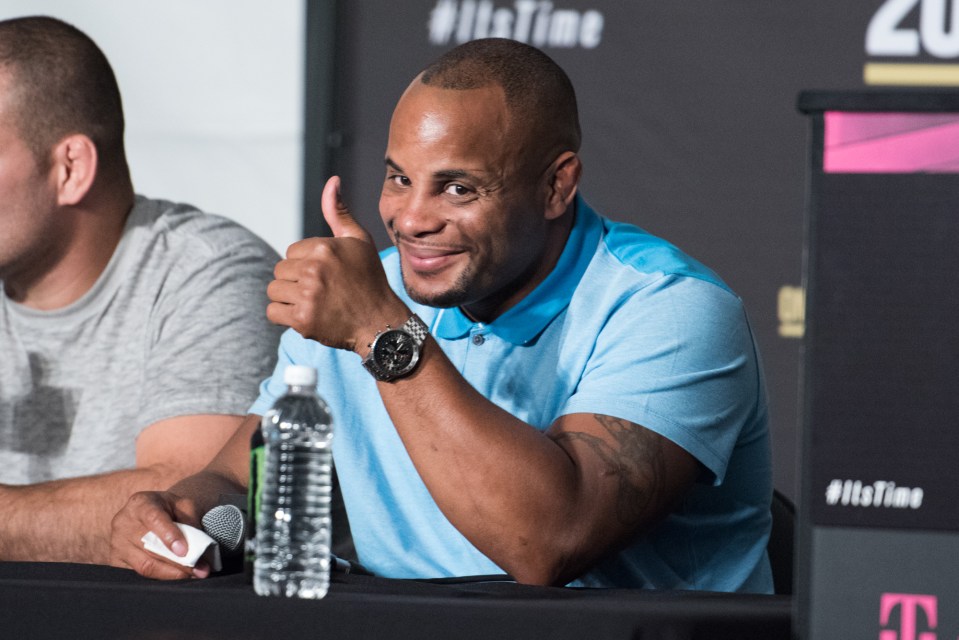  UFC light-heavyweight champion Daniel Cormier gives SunSport the thumbs-up at the UFC 200 post-fight press conference