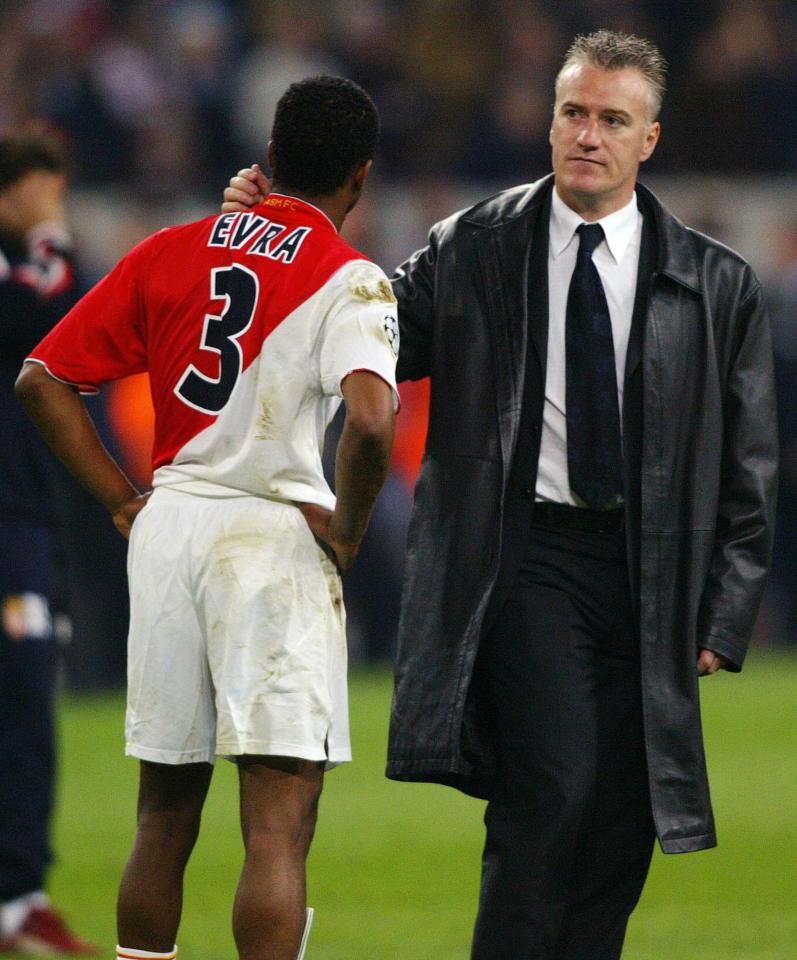 GELSENKIRCHEN, Germany: Monaco's manager Didier Deschamps (R) consoles Patrice Evra after Monaco were beaten 3-0 by Porto in the final of the Champions league football match, 26 May 2004 at the Arena AufSchalke stadium in Gelsenkirchen. AFP PHOTO MIGUEL RIOPA (Photo credit should read MIGUEL RIOPA/AFP/Getty Images)