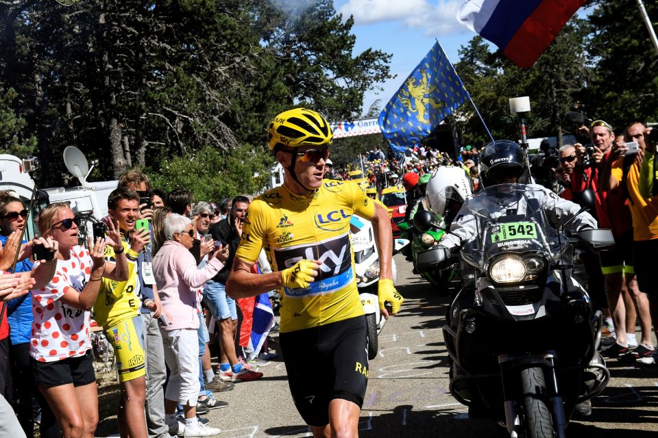 Chris Froome runs up Mont Ventoux after crashing and cracking his bike