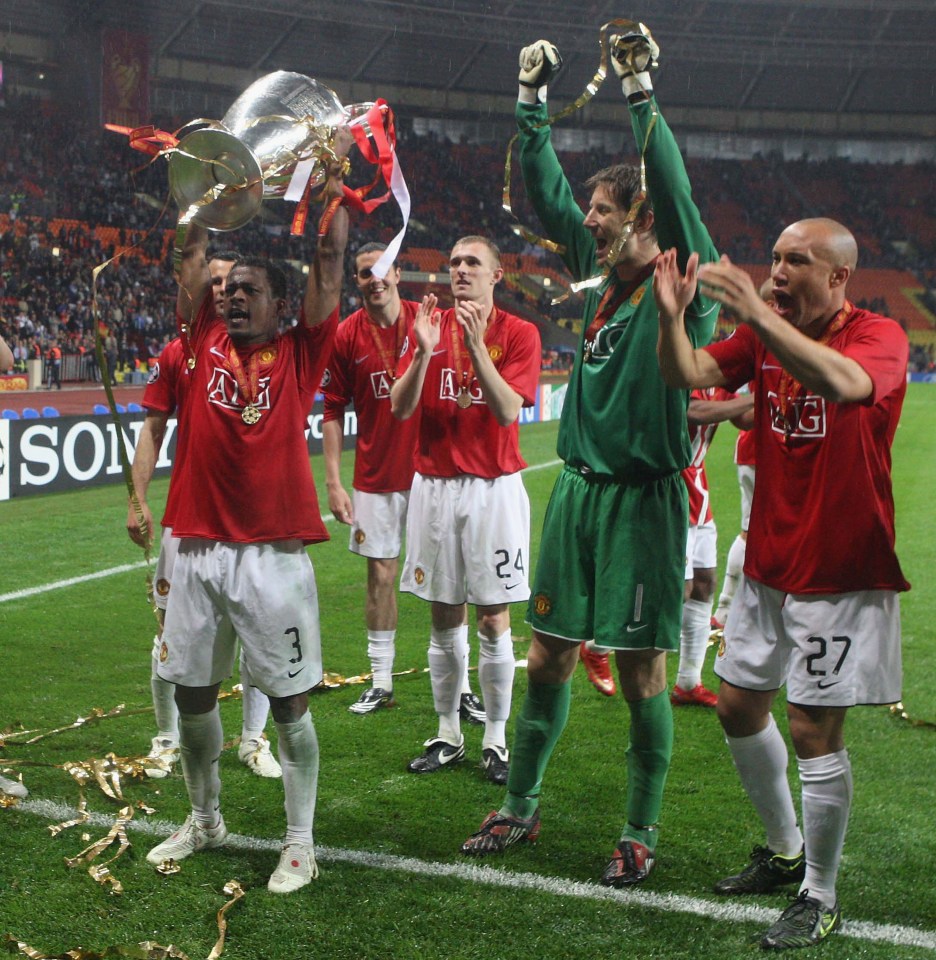 MOSCOW, RUSSIA - MAY 21: Patrice Evra of Manchester United celebrates with the trophy after winning the UEFA Champions League Final match between Manchester United and Chelsea at Luzhniki Stadium on May 21 2008 in Moscow, Russia. (Photo by Matthew Peters/Manchester United via Getty Images)