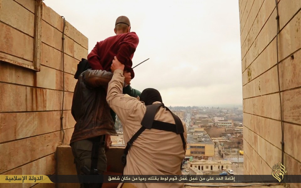  Evil ISIS thugs prepare to throw a gay man to his death