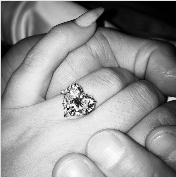  Taylor popped the question on Valentine's Day 2015 with a striking Lorraine Schwartz designed engagement ring which Gaga showcased on Instagram