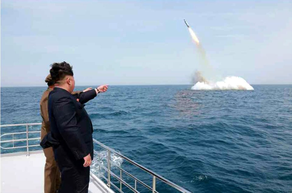  The trigger-happy Kim at the site of a 'previous missile launch'