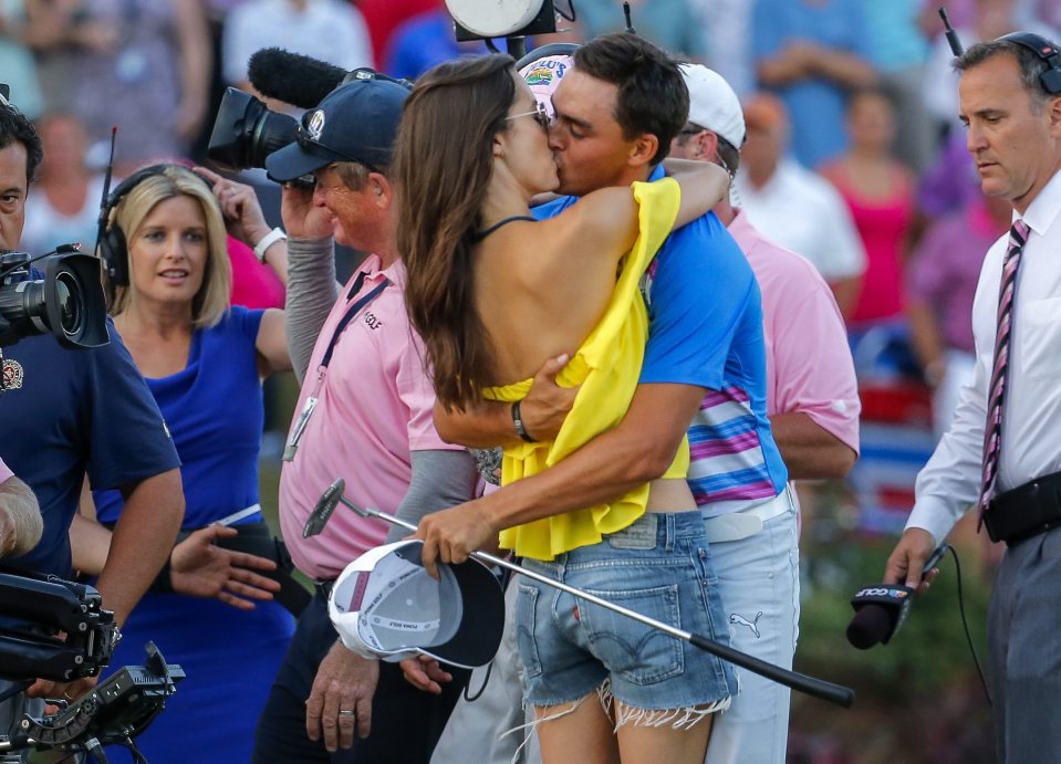 Rickie Fowler kisses Alexis after winning the Players Championship, but rumours suggest they have since split up