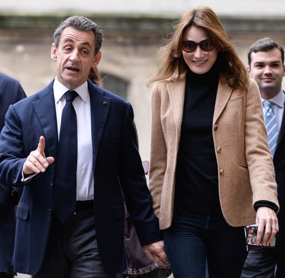 FAMEFLYNET - Nicolas Sarkozy And Carla Bruni Leave A Polling Station In Paris 527385