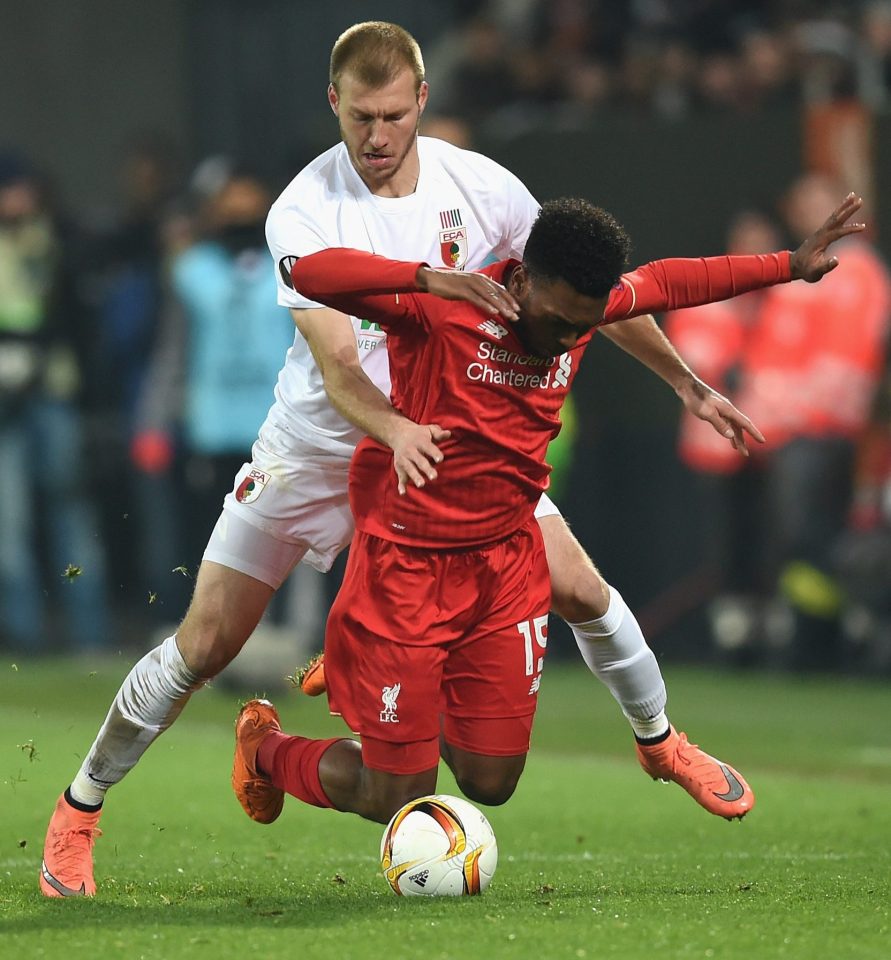  Liverpool new boy Ragnar Klavan takes on England striker Daniel Sturridge for Augsburg against the Reds in the Europa League last season