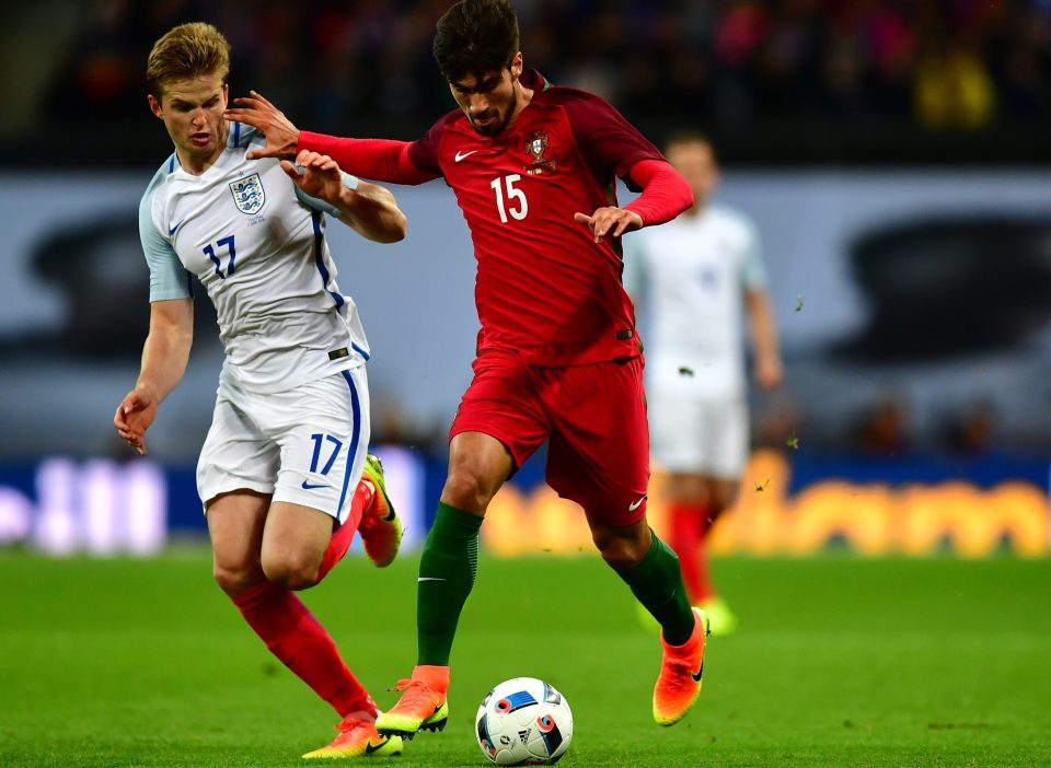  Andre Gomes holds off Eric Dier during England's friendly win over Portugal