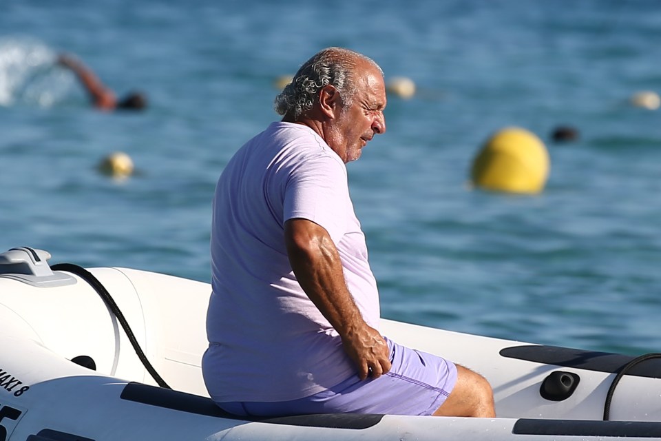  Sir Philip Green sunning himself at Club 55 In Saint Tropez