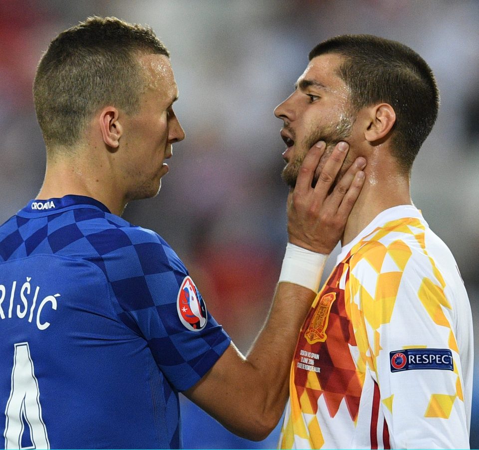  Morata faces off with Croatia's Ivan Perisic at the Euros