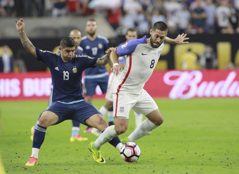  Ever Banega battles for the ball during Argentina's Copa America semi-final