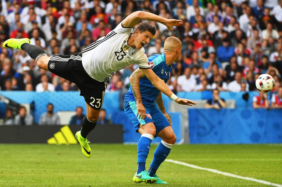  Martin Skrtel, seen tussling with Germany star Mario Gomez, is exiting Liverpool