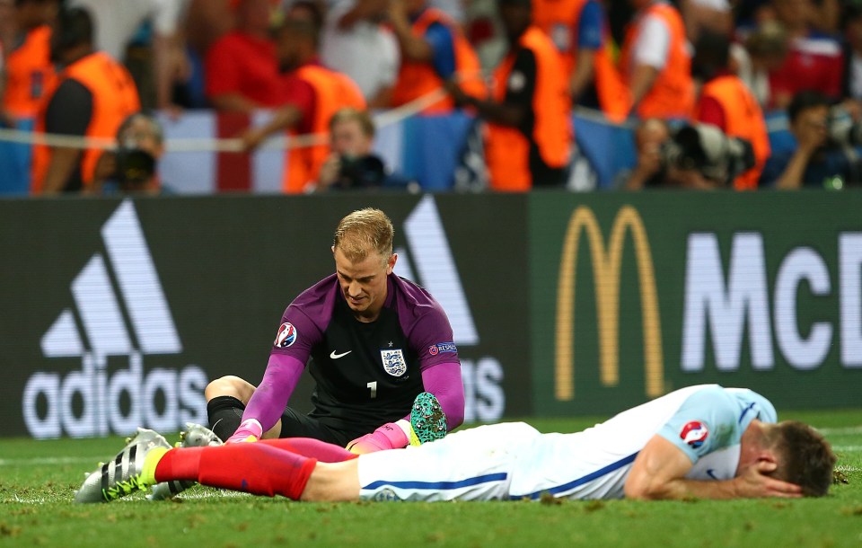  Dejected Gary Cahill lays flat on the ground after England's shock Iceland loss