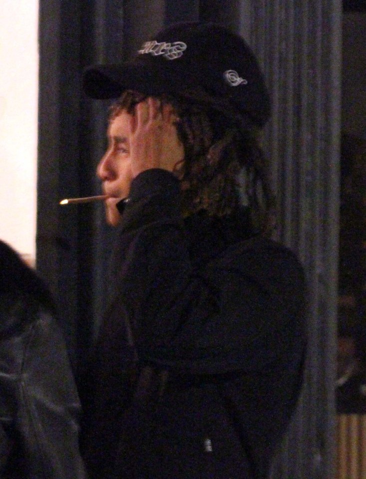  Sneaky smoke...Will Smith's son Jaden is spotted smoking a rolled-up ciggie in a Soho doorway