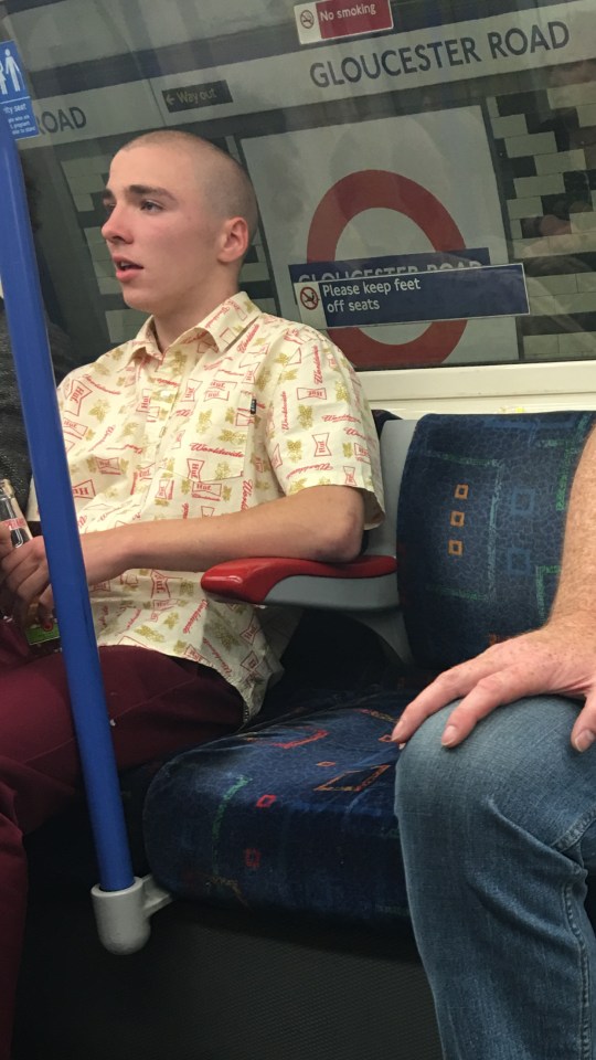 Desperado...Rocco spotted drinking beer and rolling a ciggie on the tube