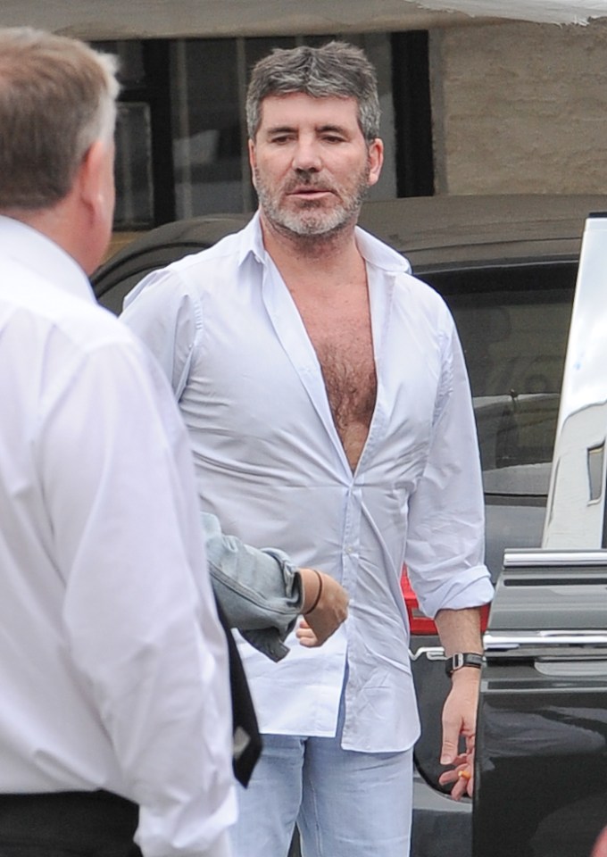  Simon look a little worse for wear as he attended an X Factor meeting in London