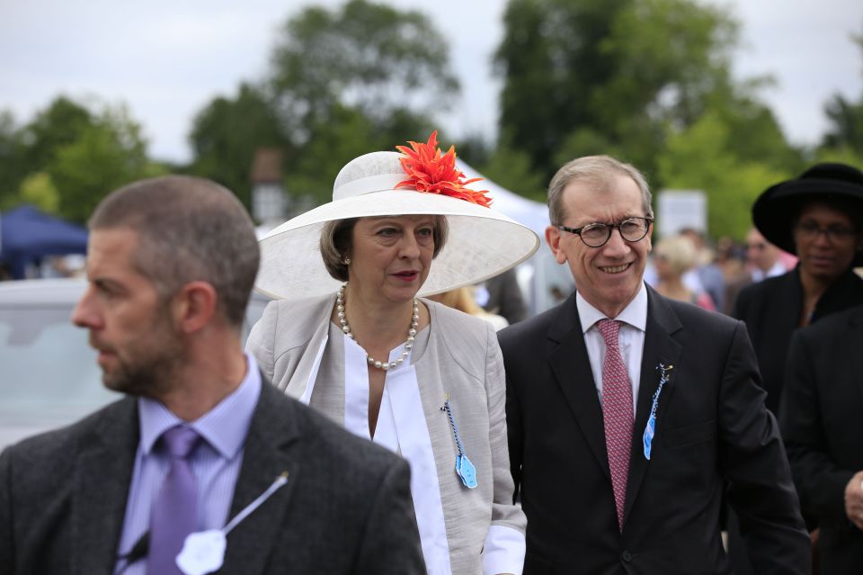  The couple, pictured in 2016, have been successful together and individually with Mr May working in banking