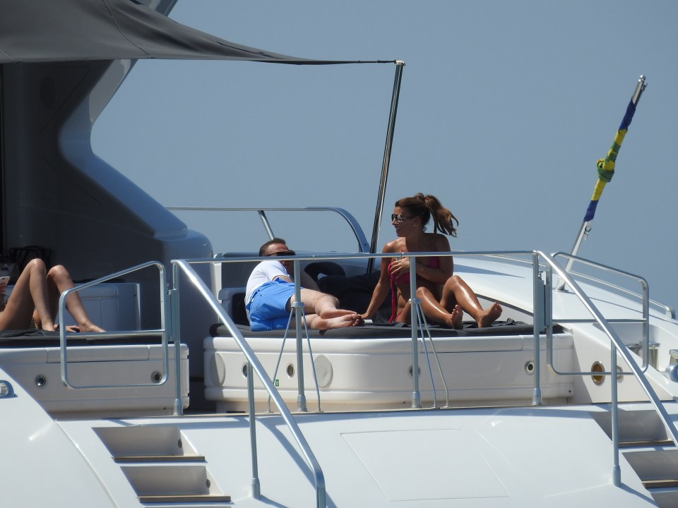  Wayne Rooney left his football failure behind and joined wife Coleen on a luxury yacht