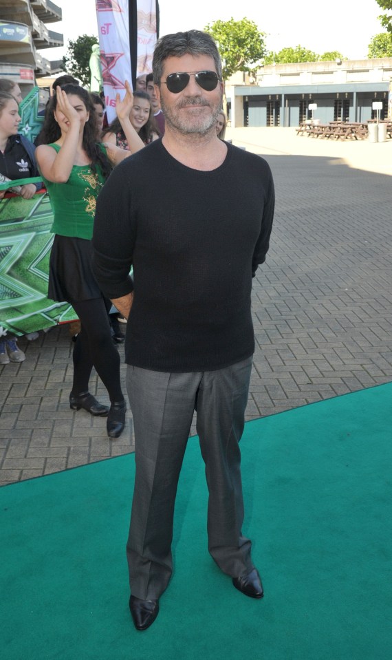  Simon changed into a black jumper as he geared up to see the Irish talent