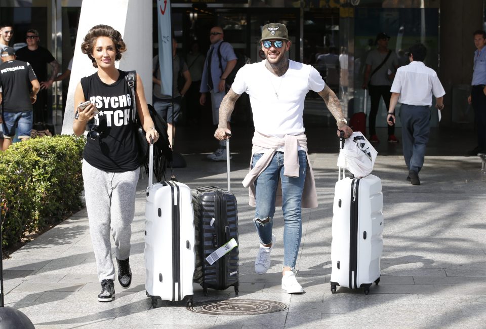  Watch out... Towie star Megan McKenna sported a Psycho b*tch vest top as she arrived in Majorca with boyfriend Pete Wicks and the rest of the cast