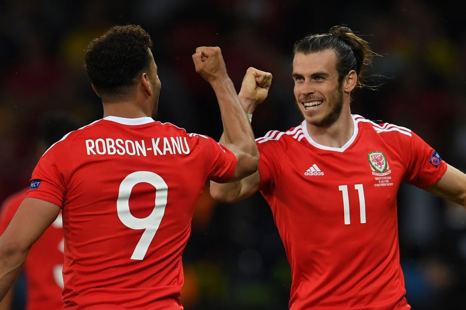  Hal Robson-Kanu celebrates his goal with Wales talisman Gareth Bale