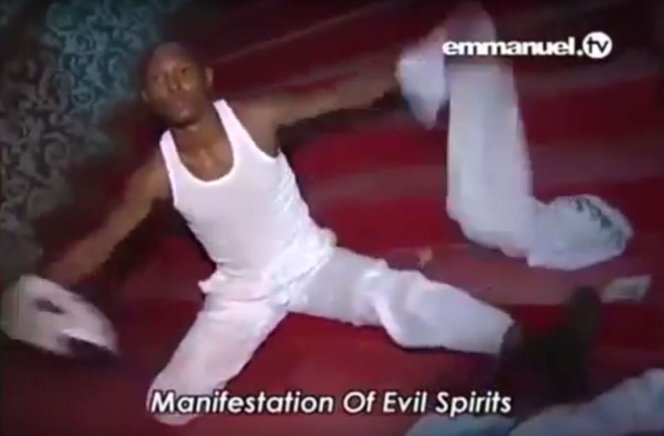  Eerie exorcism... man dressed in white starts removing his clothes