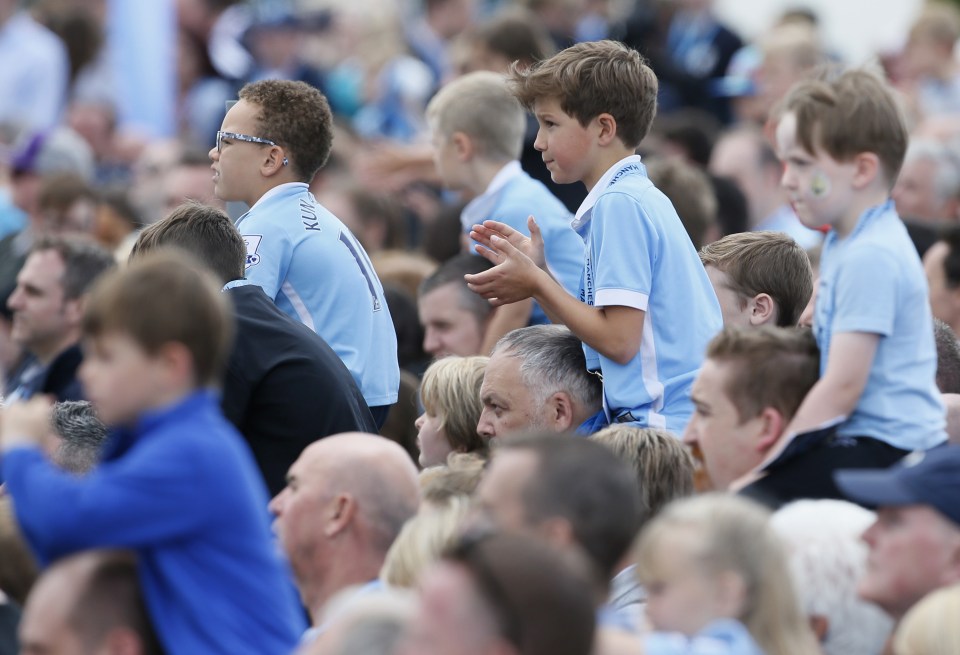  City fans merged outside the Academy stadium to catch a glimpse of Pep Guardiola