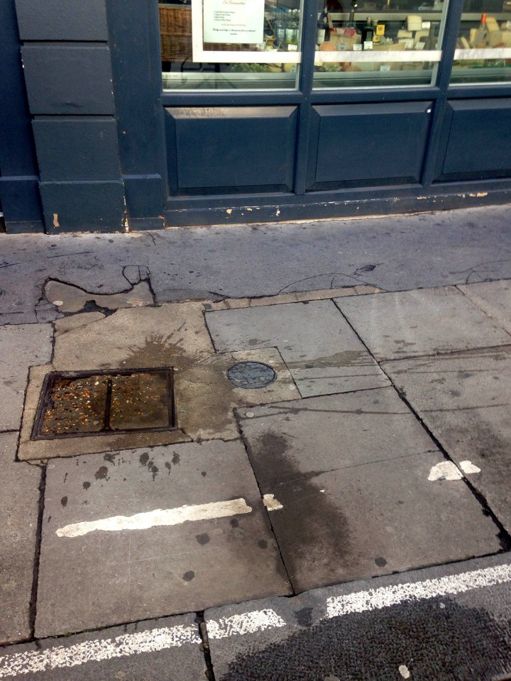  Blood-stained pavement where the victim was found at around 8.45pm last night