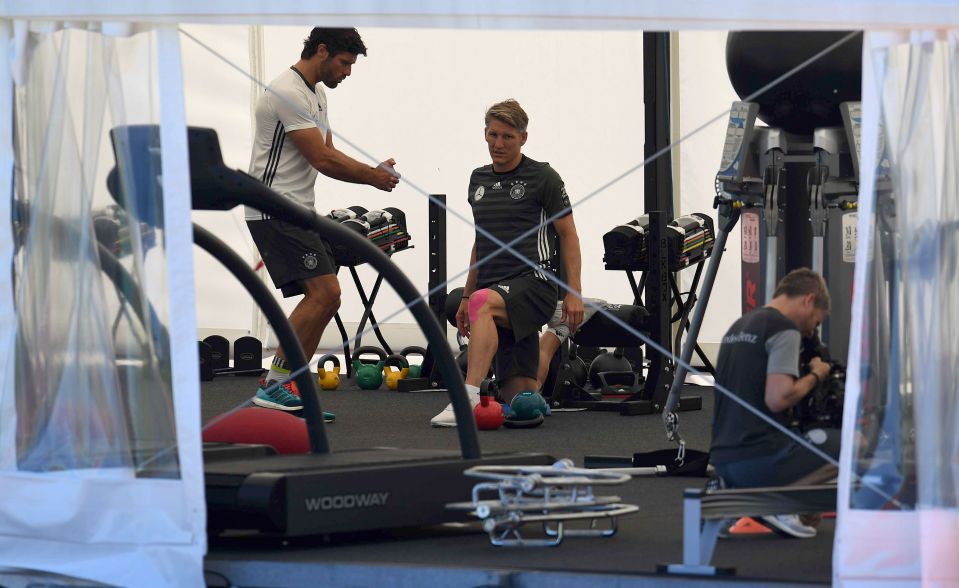  Midfielder Bastian Schweinsteiger exercises his knee in the hopes of making a full recovery before Germany's semi-final showdown with hosts France on Thursday