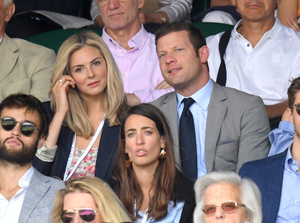 Presenter Dermot OLeary later joined her on centre court, where they sat behind Douglas Booth