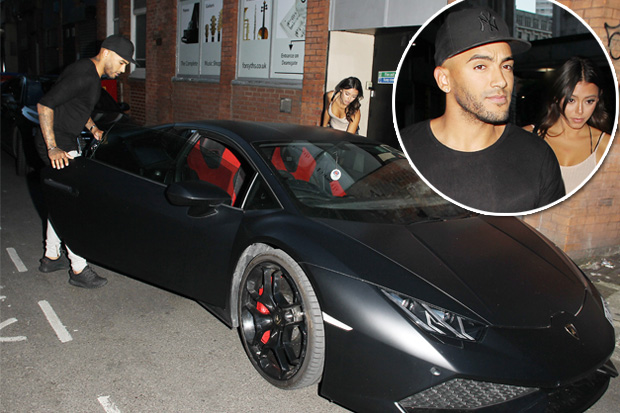 Danny Simpson and a mysterious raven-haired beauty are snapped leaving a swanky restaurant