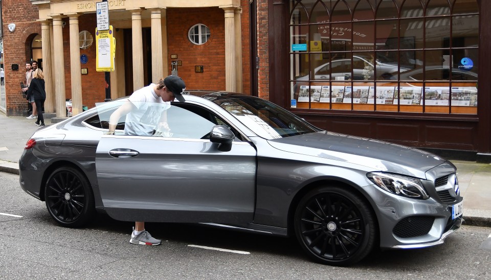  Brooklyn was seen leaving the shoot in his new £37,000 Mercedes C-Class which is believe to cost him £30,000-a-year, or £2,600 a month to insure