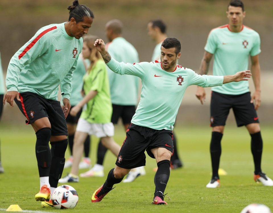  Bruno Alves and Vieirinha warm up to face Wales in tomorrow's semi-final