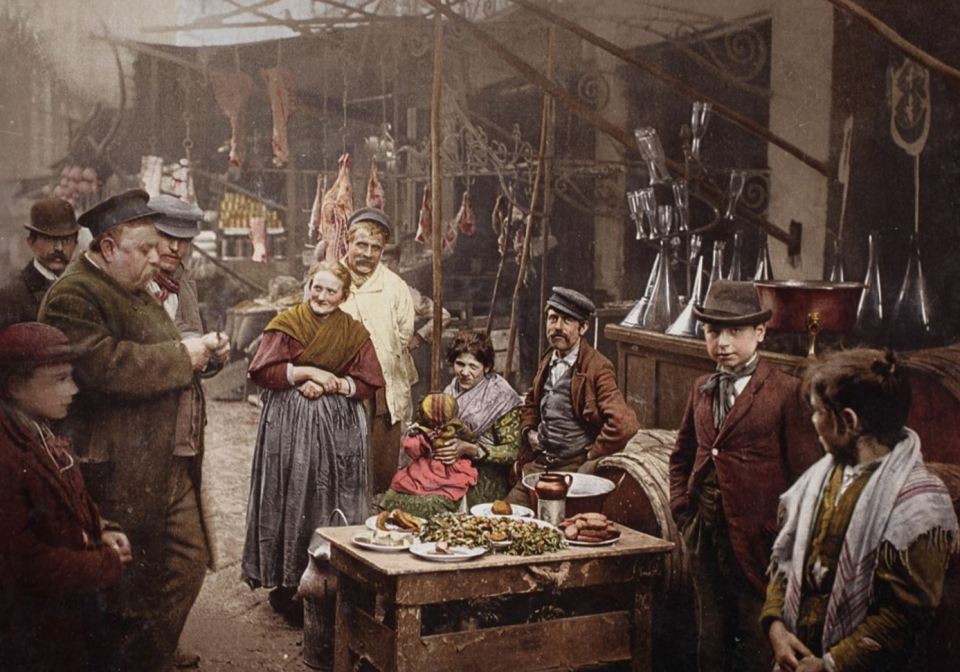 One shot depicts a bustling Italian market in the Strada del Porto in Naples, 1899