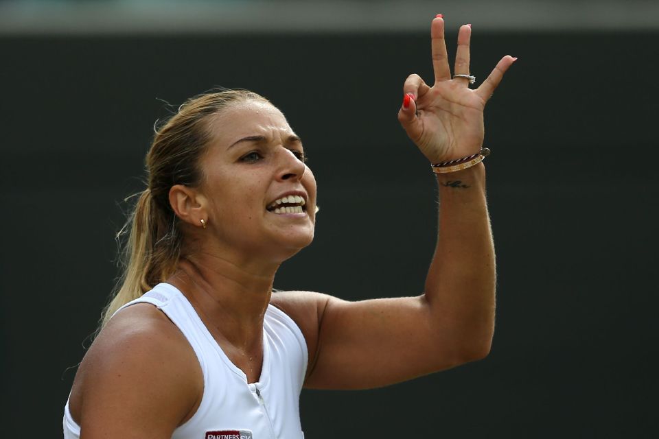 Dominika Cibulkova reacts to losing a point to Russia's Elena Vesnina