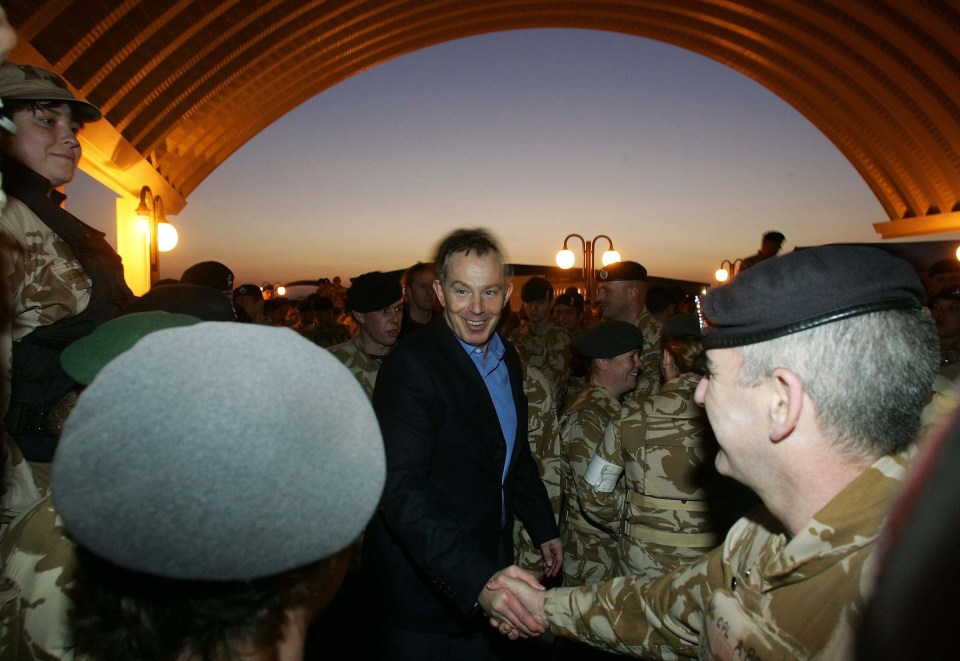  Tony Blair pictured meeting soldiers in Basra in December 2004: Today he was criticised for not having a proper plan in place for when the British troops were withdrawn from Iraq