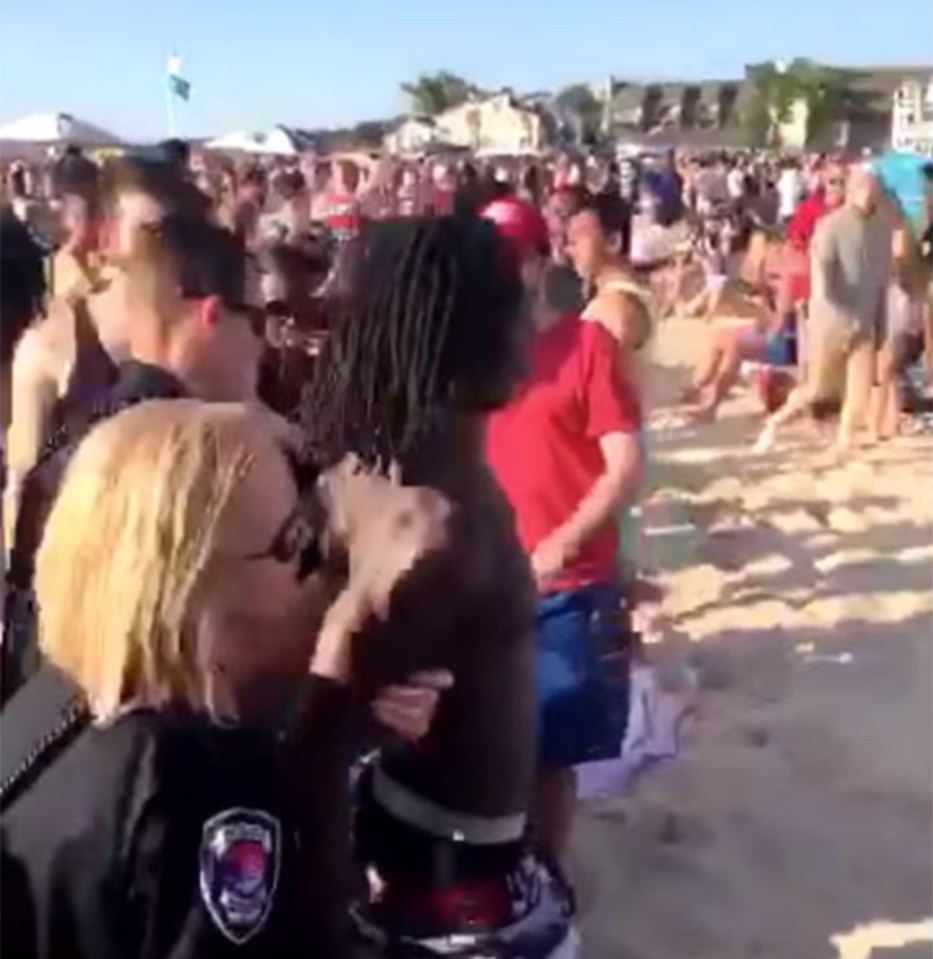 Police use pepper guns on beach revellers