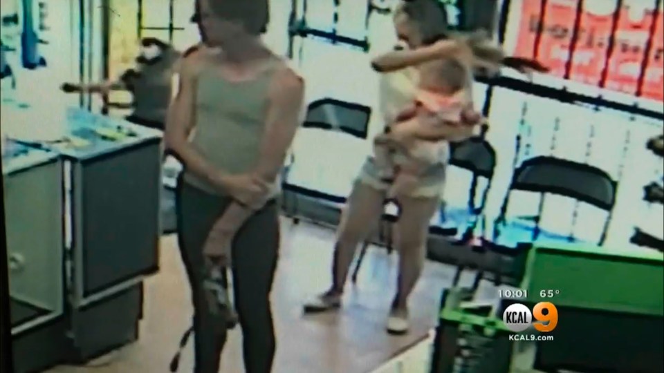  The shocking footage shows the girl being snatched by a man from outside