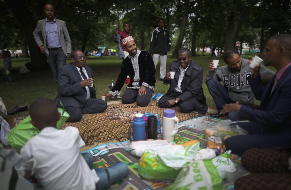  Morning prayers marking the end of Ramadan fasting were followed by eating and drinking