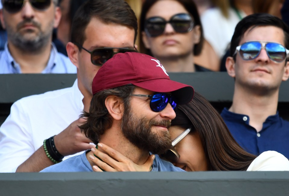  Russian Supermodel Irina Shayk seemed unable to keep her hands off of her Hollywood actor boyfriend Bradley Cooper at Wimbledon