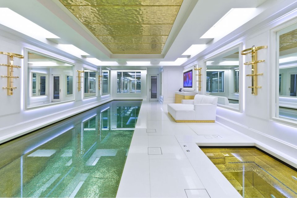  The basement features a full-length pool, and is one of the house's most stunning features