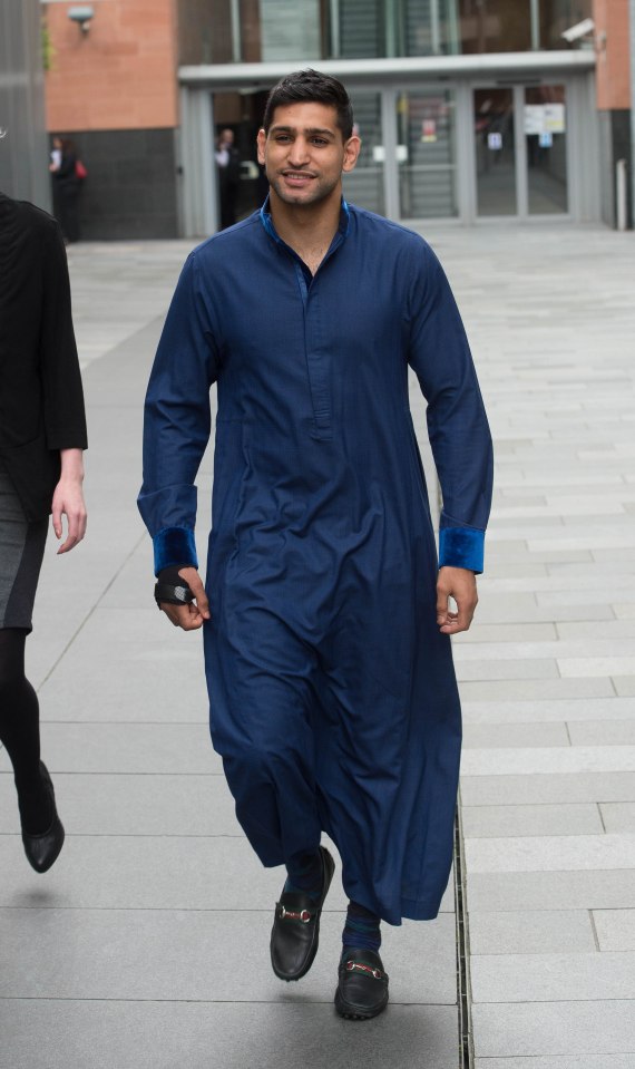  Amir Khan leaves Manchester magistrates court after escaping driving ban