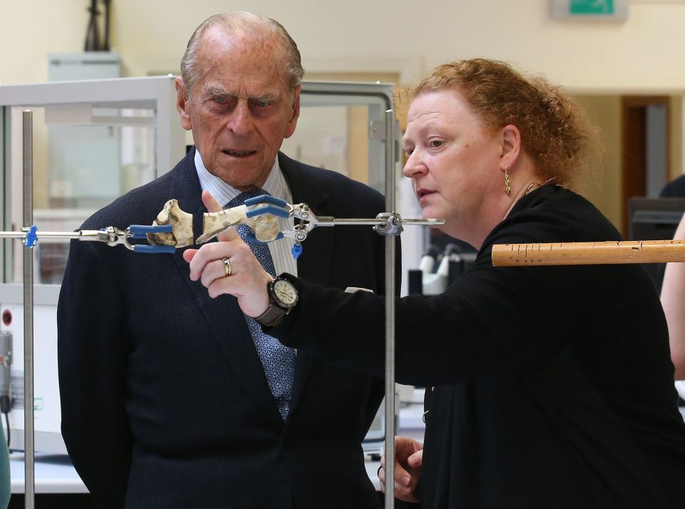 The Duke of Edinburgh is shown bone which was cut using a saw by Professor Sue Black (right), during a visit to the Leverhulme Research Centre for Forensic Science at Dundee University. PRESS ASSOCIATION Photo. Picture date: Wednesday July 6, 2016. During the visit to the forensic laboratory, part of the Centre for Anatomy and Human Identification, Queen Elizabeth II and Prince Philip viewed various techniques such as facial reconstruction, fingerprinting and electrical fire investigation. See PA story ROYAL Queen. Photo credit should read: Andrew Milligan/PA Wire