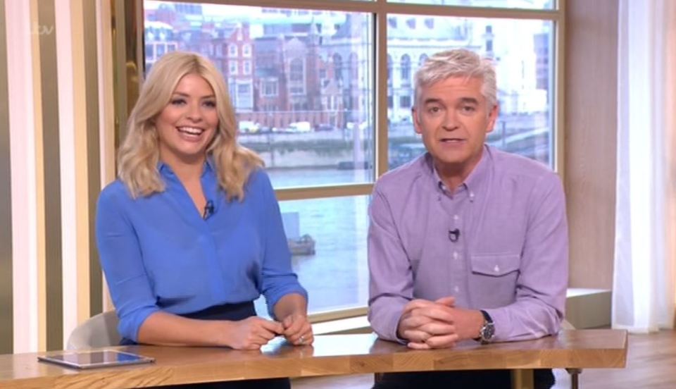  Holly wore a sexy sheer blue shirt as she presented with Phillip Schofield