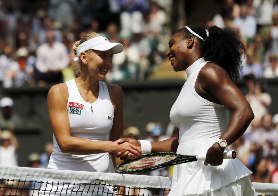 Serena Williams of the U.S, right, shakes hands with Elena Vesnina